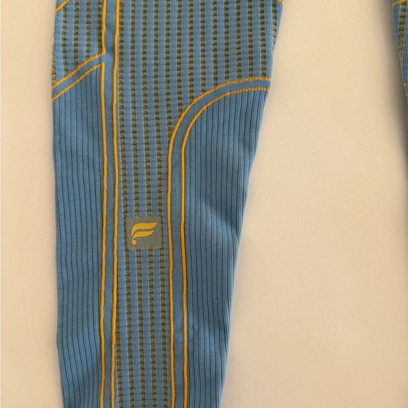 Fabletics Blue Leggings with Yellow Accents - Picture 7 of 9